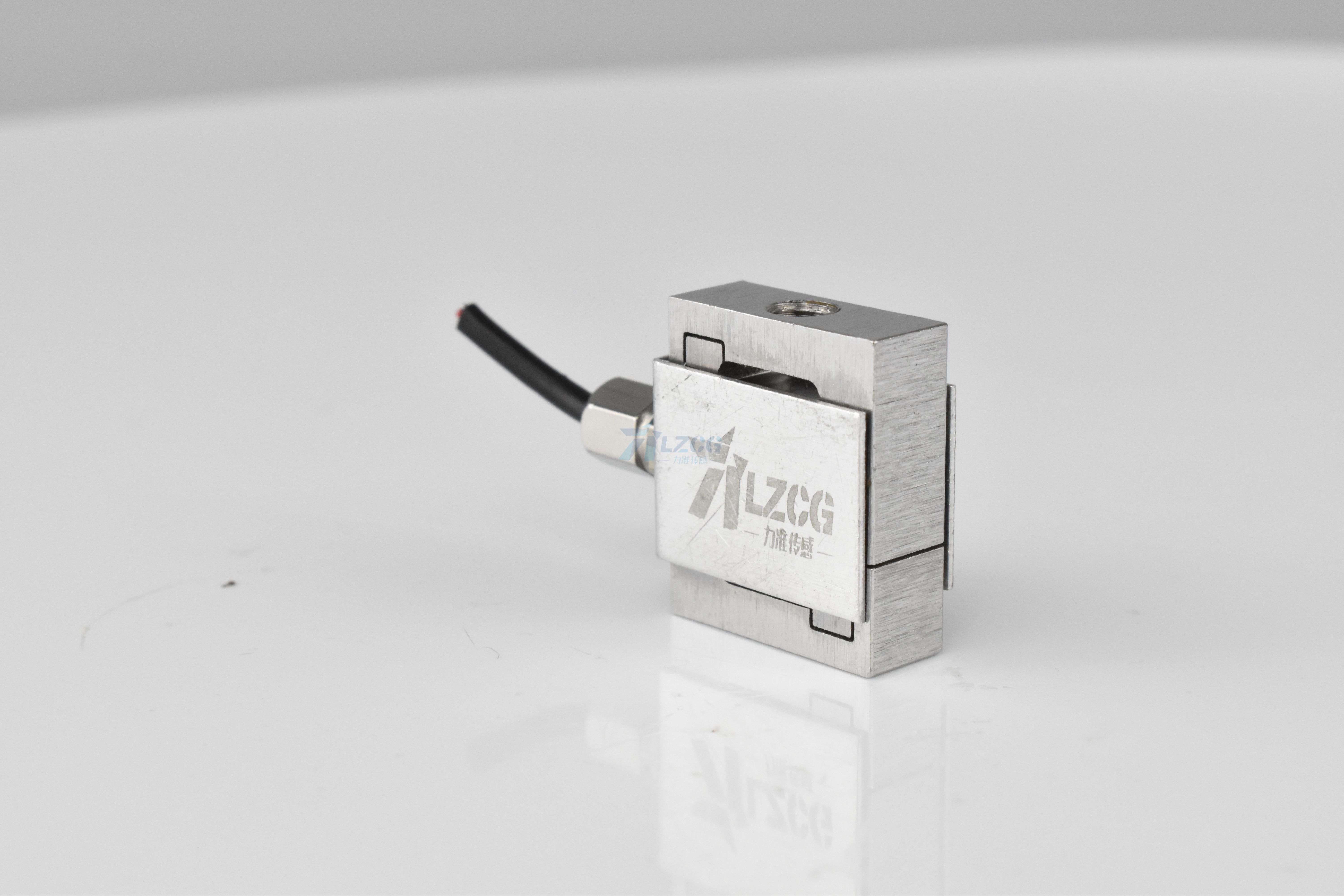 應(yīng)變稱重傳感器將其負(fù)載轉(zhuǎn)換為電信號(hào)(圖1) DSC_0545.JPG